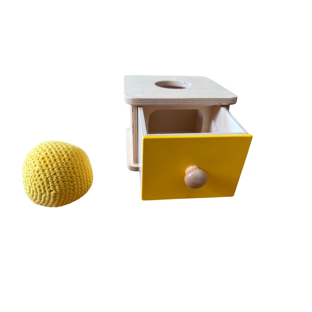 Monti Kids motor planning wooden yellow‎ box with drawer and yellow knit ball